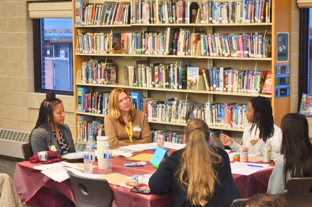  A Meeting of five people at Farmington Public Schools
